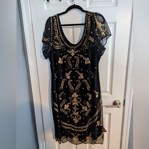Gatsby-inspired black plus sized dress with gold embroidery